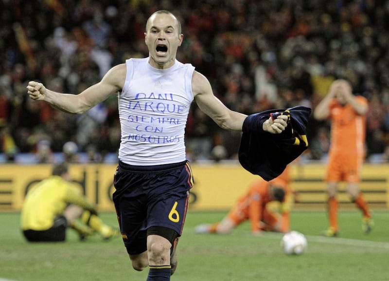 Spain&#39;s Andres Iniesta celebrates after scoring the winning goal in the 2010 World Cup final 