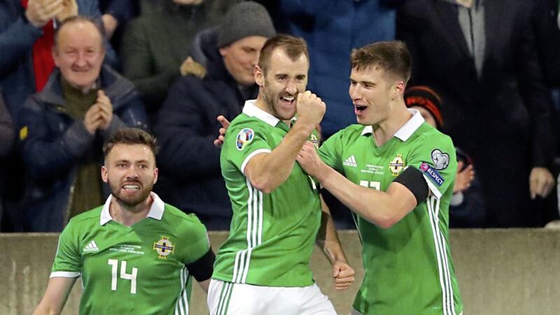 Northern Ireland&#39;s Niall McGinn (centre) celebrates scoring his side&#39;s first goal of the game during the UEFA Euro 2020 Qualifying Group C match against Estonia. 