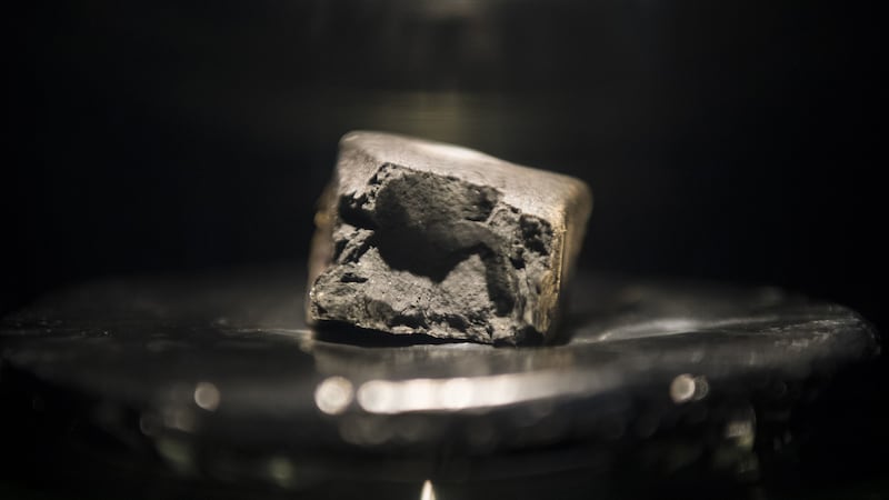 A meteorite that fell in a sheep field in Winchcombe is on display at the Natural History Museum in London
