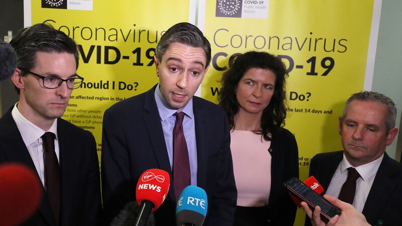 Minister for Health Simon Harris (second left) alongside (from left) Senior Chief Medical Officer Dr Ronan Glynn, HSE Public Health Consultant Dr Sarah Doyle, and HSE Director General Paul Reid, speaks to media after meeting with HSE staff who are activating the public awareness campaign for COVID-19 (Coronavirus) in the baggage hall of Terminal 2 at Dublin Airport. Picture by Brian Lawless/PA Wire&nbsp;