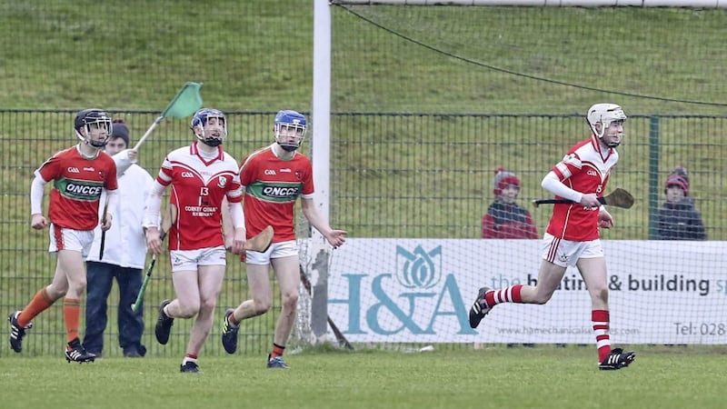 Loughgiel&#39;s Jack McCloskey and Roan McGarry wheel away to celebrate a goal during the Ulster Minor Hurling Tournament semi-final win over Lavey at Ballinascreen on New Years Eve Picture: Margaret McLaughlin 