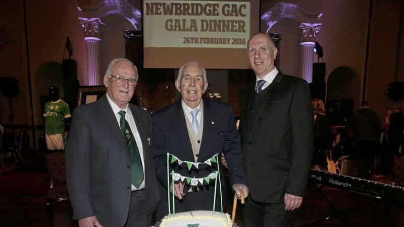 Owen Gribbin (centre) at Newbridge GAC&#39;s 90th anniversary gala dinner earlier this year. Asked to cut the cake as it co-incided with his own 90th birthday, he is pictured with club president Harry Gribbin and chairman Liam Devlin 