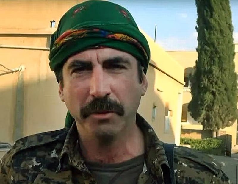A still from the YPG video showing Finbar Cafferkey in uniform