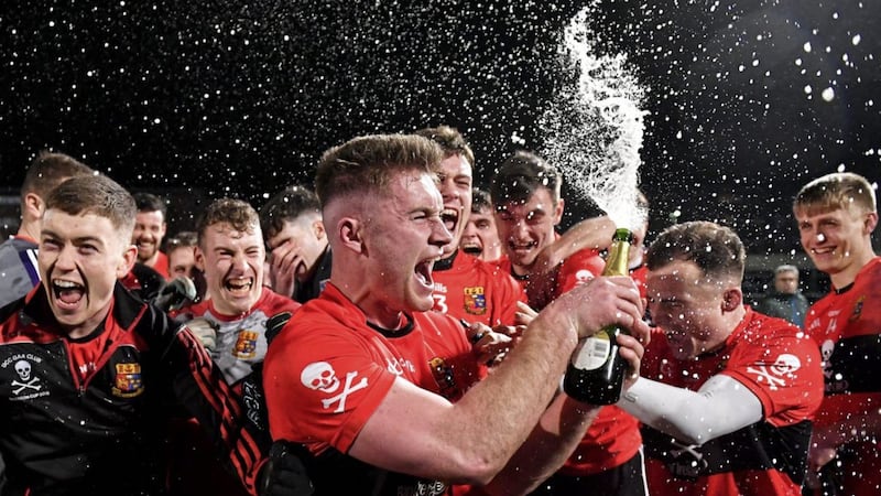 Kevin Flahive of University College, Cork (UCC) celebrates with champagne after the Electric Ireland HE GAA Sigerson Cup final match between St Mary&#39;s University College Belfast and UCC at O&#39;Moore Park in Portlaoise, Laois on February 20 2019. Picture by Piaras &Oacute; M&iacute;dheach/Sportsfile 