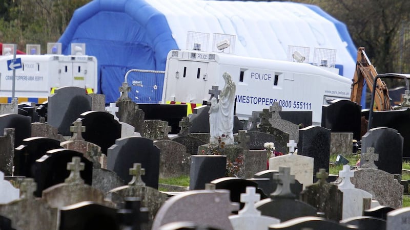 Police at the exhumation of the body of Daniel Rooney in Milltown Cemetery&nbsp;
