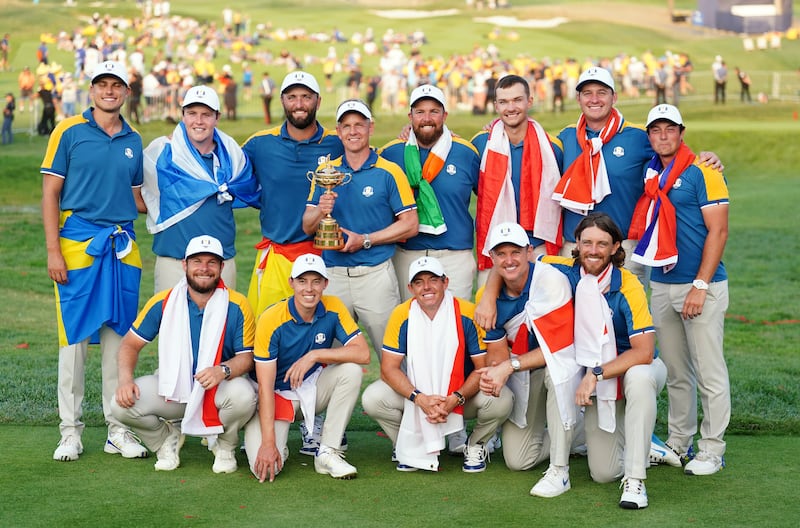 Team Europe Captain Luke Donald and players hold the Ryder Cup Trophy after Europe regained the Ryder Cup following victory over the USA on day three of the 44th Ryder Cup at the Marco Simone Golf and Country Club, Rome, Italy on Sunday October 1, 2023. Picture by Mike Egerton, PA.