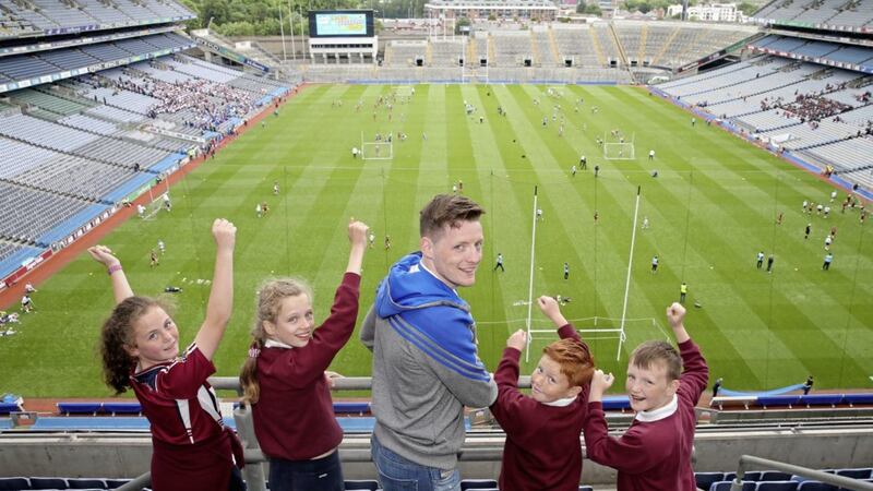 Monaghan&#39;s Conor McManus with pupils from one of the winning schools, St Columba&#39;s PS, Draperstown, at the Irish News School Trip to Croke Park day out. Pic by Declan Roughan 