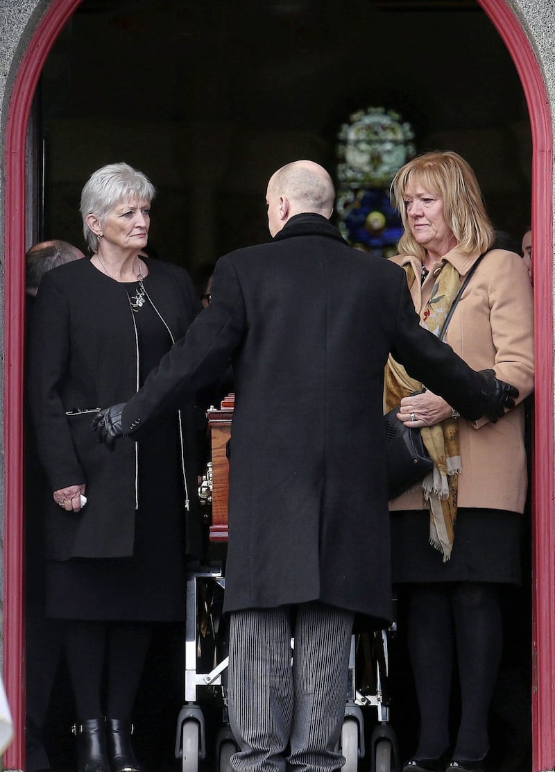 Bobby Sands sisters Marcella and Bernadette walk alongside the coffin of their mother Rosaleen (95) at the funeral in St Oliver Plunkett&#39;s Church, Blackrock Co Louth Picture Mal McCann. 