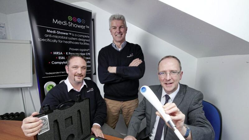 Medi-Shower&#39;s Christie Allen and James Clarke with Des Gartland (right) from Invest NI 