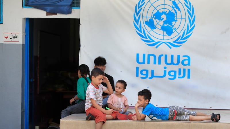 Palestinian children who fled with their parents from their houses in the Palestinian refugee camp of Ein el-Hilweh, gather in the backyard of an UNRWA school in Sidon, Lebanon in September 2023 (Mohammed Zaatari/AP)