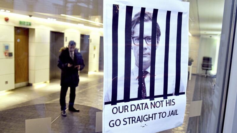 protest: A sign put up by a protester at the offices of Cambridge Analytica (CA) in central London  PICTURE: Dominic Lipinski/PA 