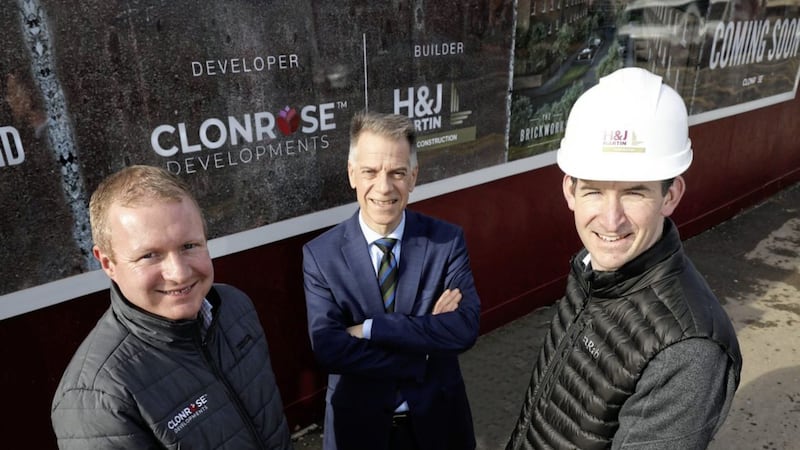 Follow the Ormeau brick road: from left - Stephen Davey (Clonrose Developments dDirector), Michael McDonnell (Choice Housing chief executive) and Gareth Moore (H&amp;J Martin construction director) 