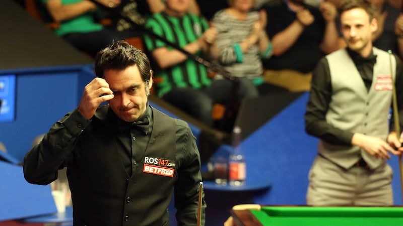 Ronnie O'Sullivan leaves the table after winning his game against David Gilbert during day three of the Betfred Snooker World Championships at the Crucible on Monday<br />Picture by PA