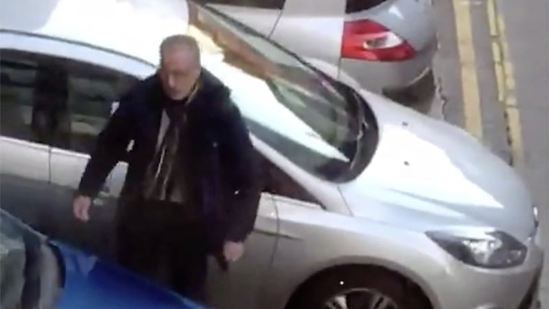 Screen grabs from social media showing Sinn Fein MLA Gerry Kelly removing a wheel clamp from his car. Picture by Pacemaker 