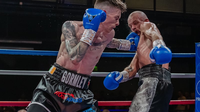 Lee Gormley lands a left hook during his professional debut win in June. Picture:  Phil Hill (Pips Photography)