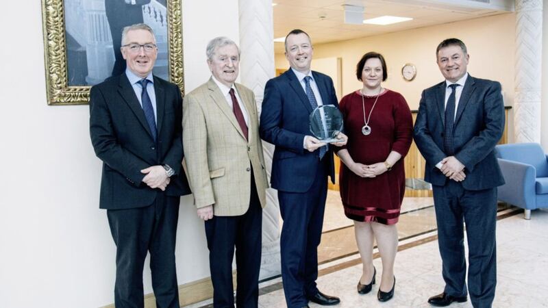 Pictured celebrating Norbrook Holdings achievement as top of the IoD NI Top 100 Locally Controlled Northern Ireland Businesses list are Norbrook director of legal affairs, Martin Murdock; economist John Simpson; Norbrook CEO, Liam Nagle; BDO NI tax director, Angela Keery; and IoD chairman, Gordon Milligan.  