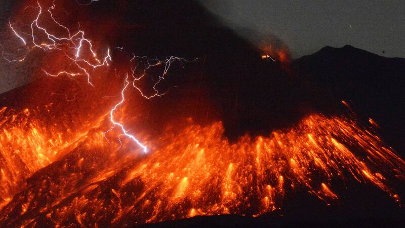 &nbsp;Japanese television showed an orange burst out of the side of Sakurajima, near the summit on the southern island of Kyushu, accompanied by lightning-like flashes
