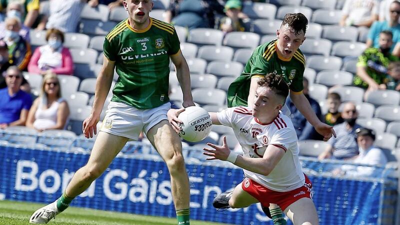 Tyrone&#39;s Eoin McElholm under pressure during the Electric Ireland GAA Football All-Ireland Minor Championship final between Tyrone and Meath at Croke Park Dublin on 08-28-2021. Pic Philip Walsh. 