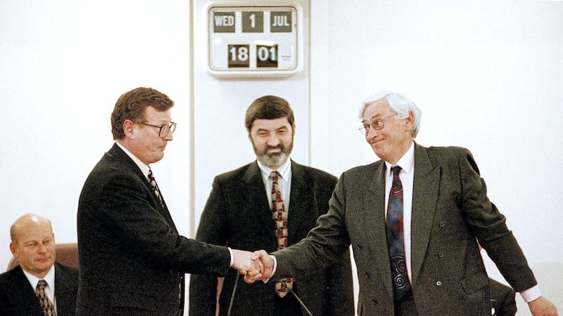 David Trimble and Seamus Mallon are elected First and Deputy First Ministers on July 1 1998 as Speaker Lord Alderdice looks on 
