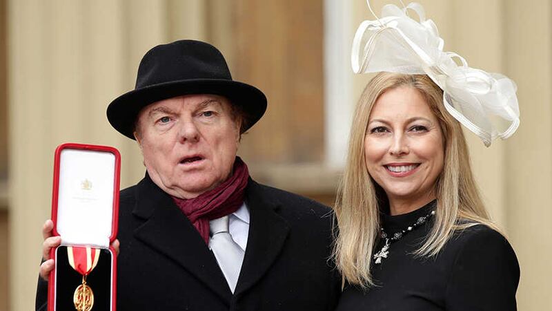 Singer, songwriter and musician Van Morrison at Buckingham Palace, London, with daughter Shana Morrison after he was knighted by Prince Charles