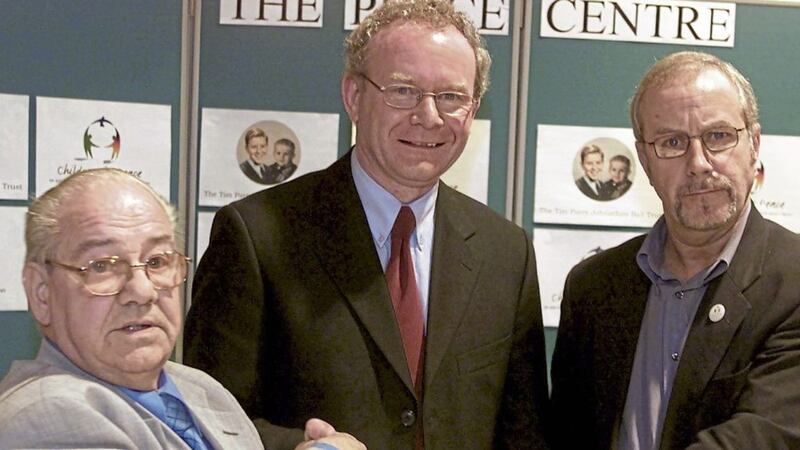Colin Parry, right, with Wilf Ball and the late Martin McGuinness at the Tim Parry Johnathan Ball Peace Centre in Warrington. 