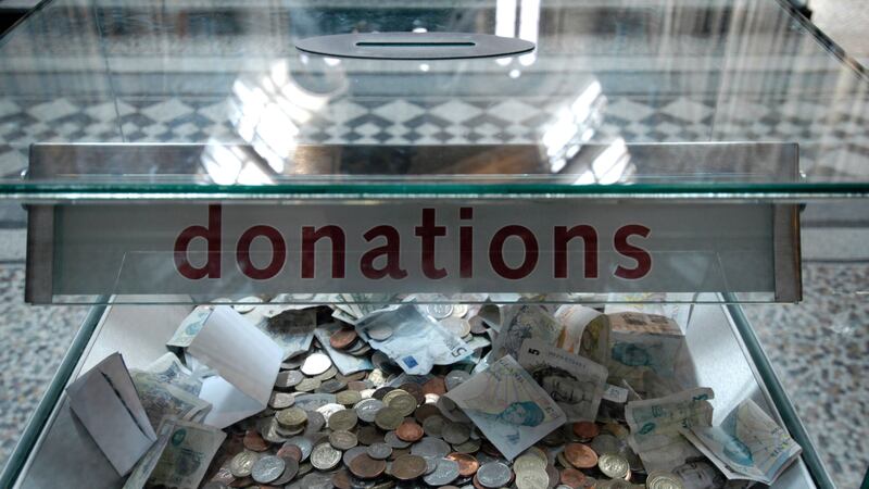 The UK is third for donating money to charity but ranks 17th in an overall global index (Alamy/PA)