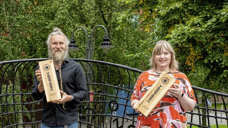Gawain Morrison, Creative Lead of The Ogham Grove, and Susan Picken, Director of Culture Night and the Cathedral Quarter Trust, help launch trail event 