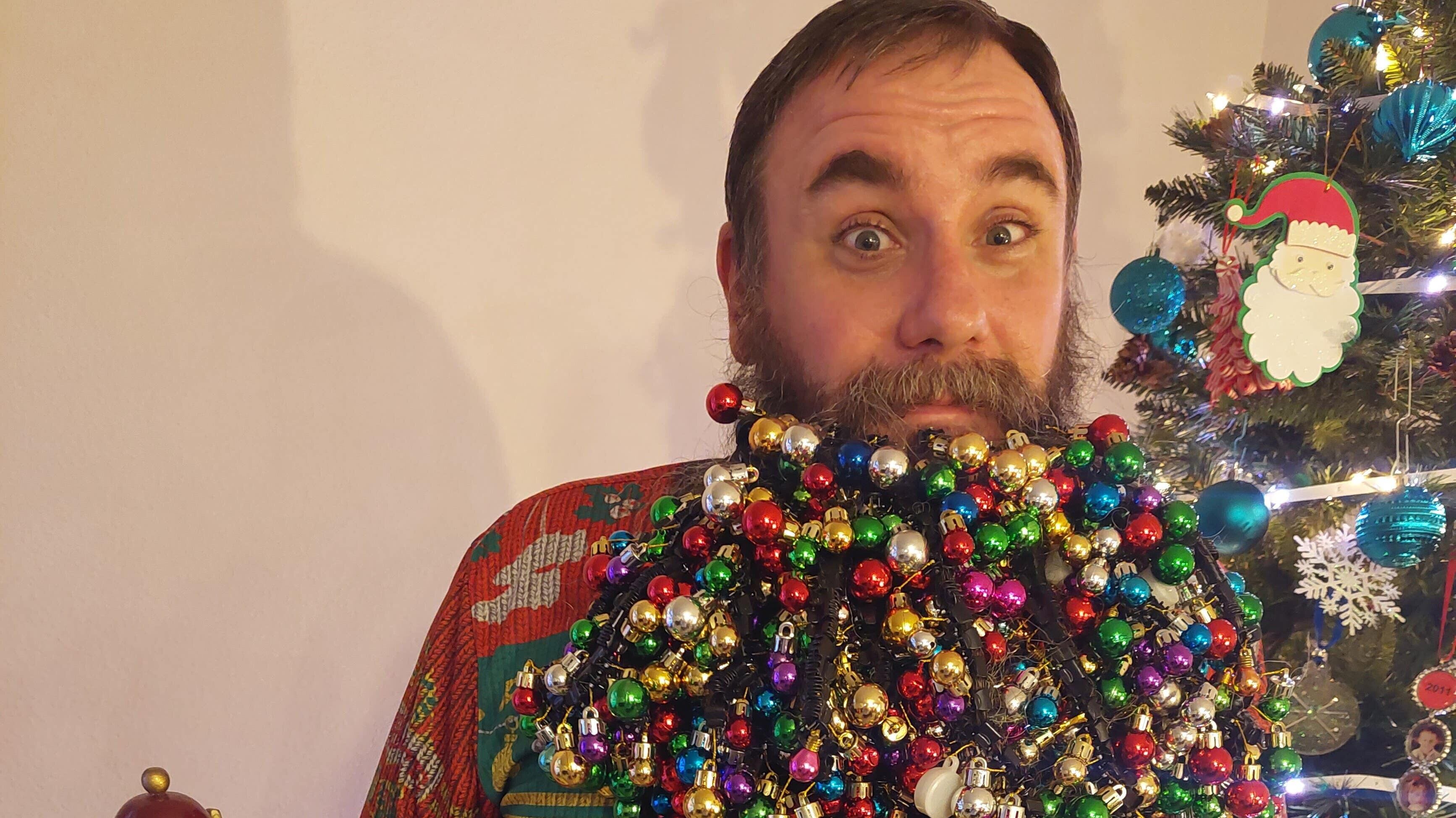 Joel Strasser has beaten his own world record this year with 710 baubles attached to his beard.