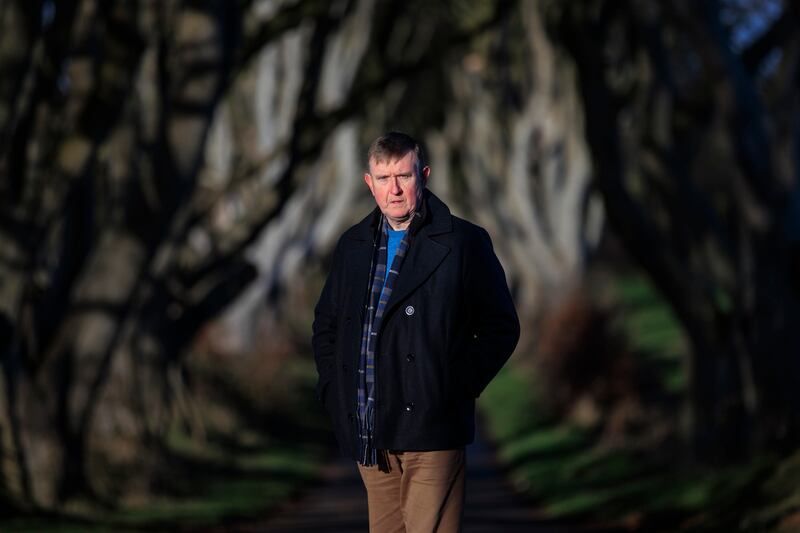 DUP Councillor Mervyn Storey of Causeway Coast and Glens Borough Council at the Dark Hedges near Armoy in Co Antrim. The tunnel of trees became famous when it was featured in the HBO fantasy series Game Of Thrones and now attracts significant numbers of tourists from around the world. Six of the trees had being removed with remedial work being carried out on several others. Picture date: Tuesday December 05, 2023. PA Photo. See PA story ULSTER Hedges. Photo credit should read: Gilmore Family/PA Wire