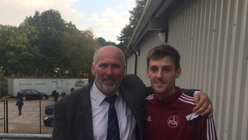 Institute FC chairman Bill Anderson with footballer Niall Grace, celebrating the club's last-minute winner against Lurgan Celtic on Saturday. Picture from Institute FC on Twitter