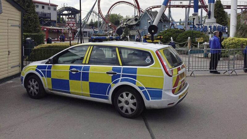 Handout photo taken of a police vehicle at Drayton Manor Theme Park in Drayton Manor, Tamworth, where the Splash Canyon ride has been closed after reports of someone falling in the water. Picture David Charles 