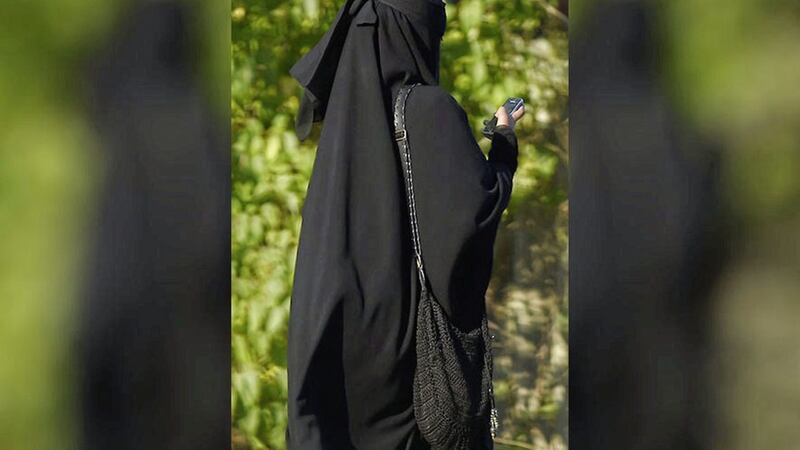 A Muslim woman wearing a burka. Picture by Joe Giddens, Press Associations 