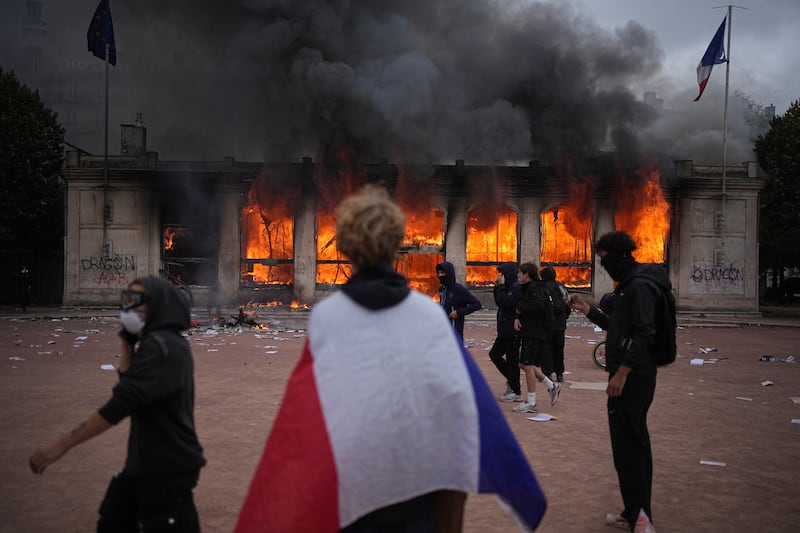 Clashes, fires and looting break out as protesters rally across France