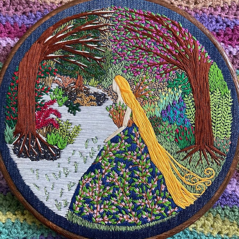 Gemma stitches women in woodland scenes, including The Lady of Spring