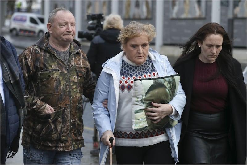 Padraig Fox's family leave Belfast Crown Court today where the court heard that they had been &quot; devastated by his loss&quot;. Picture by Hugh Russell&nbsp;