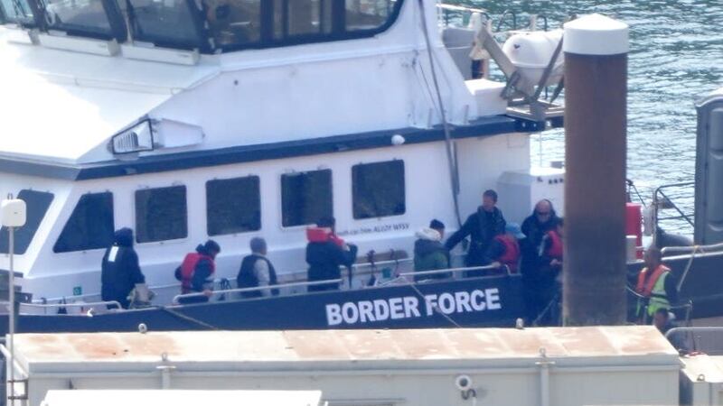 A group of people thought to be migrants are brought in to Dover, Kent, from a Border Force vessel (PA)