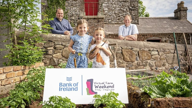 Confirming this year&#39;s Bank of Ireland open farm weekend from Friday July 31 to Sunday August 2 are Richard Primrose, the bank&#39;s agri-business manager and open farm weekend chairman and UFU deputy president David Brown with sisters Molly (5) and Edith Tumelty (4). Photo: Brian Morrison 