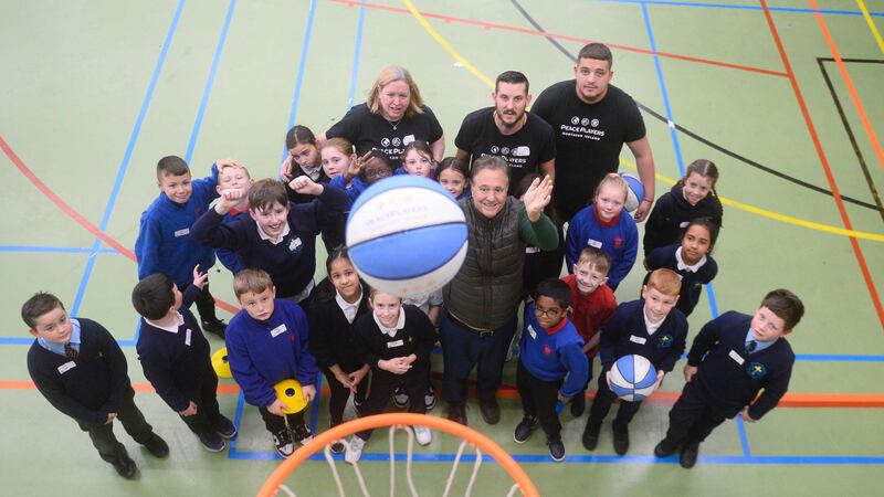 Boston Celtics co-owner Stephen Pagliuca meets with children from several Belfast schools. Picture by Mark Marlow