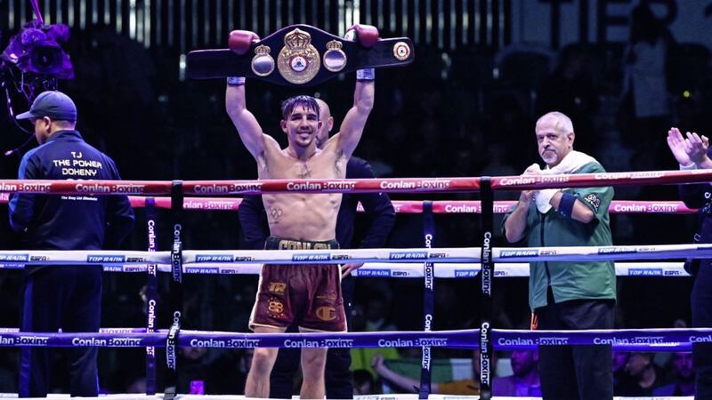 Michael Conlan won the WBA Interim featherweight title by beating TJ Doheny at Falls Park in Belfast on Friday. Pic Colm Lenaghan/Pacemaker 
