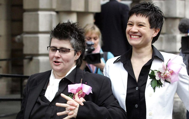 File photo dated 19/12/05 of Shannon Sickles (right) and Grainne Close outside Belfast City Hall after their civil partnership ceremony&nbsp;