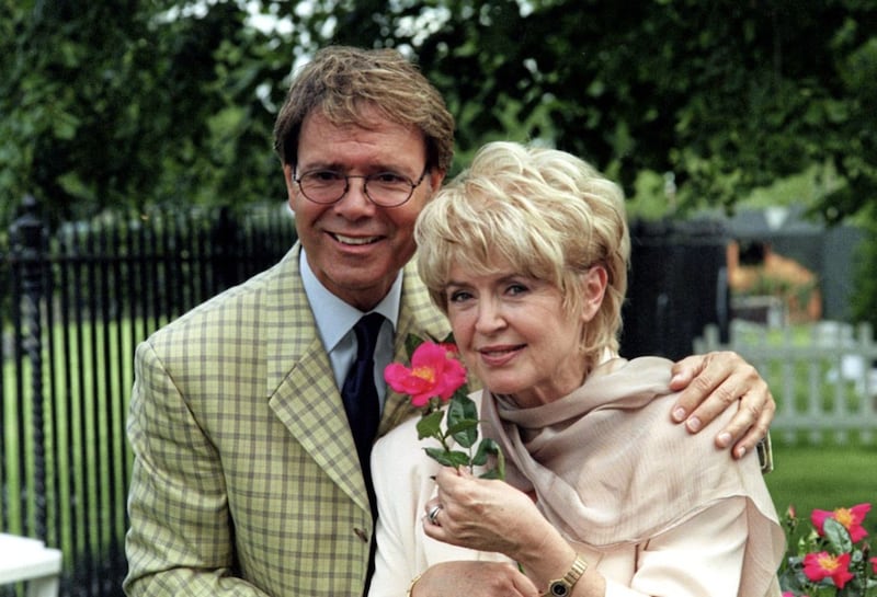 Sir Cliff Richard and Gloria Hunniford with a Jill Dando rose at the Hampton Court Flower Show in 1999 