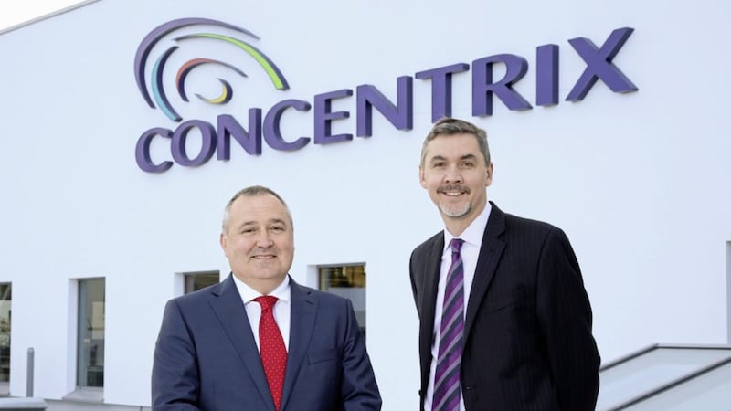 Concentrix senior vice-president Philip Cassidy (left) and president Chris Caldwell at the official opening of the company&#39;s new Maysfield Belfast facility. Photo: Darren Kidd/PressEye 