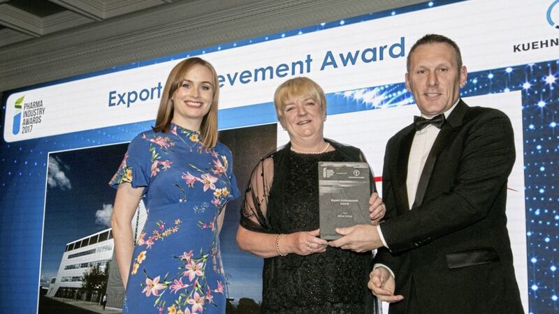 Rhona Fitzgerald, supply chain manager, and Karen Fahey, research chemist, receive the award on behalf of Almac Group from Mike Byrne, chief executive officer, GS1 Ireland (category sponsor) 