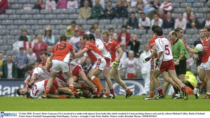 Tyrone&#39;s Peter Canavan (13) is involved in a melee with players from both sides which resulted in him being shown a red card by referee Michael Collins during the 2005 Ulster Senior Football Championship Final Replay with Armagh 