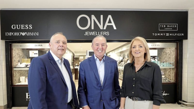 ONA Jewellers owners Liam and Oonagh McGranaghan are joined by Hugh Kennedy, owner of the Kennedy Centre. Photo: Kelvin Boyes/Press Eye 