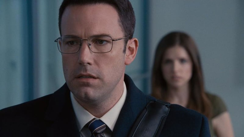 Ben Affleck as Chris Wolff and Anna Kendrick as Dana Cummings in The Accountant 