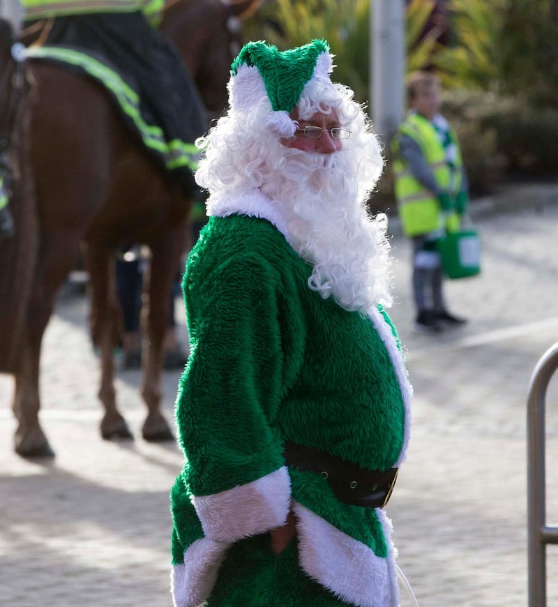 A Celtic fan dressed as Santa