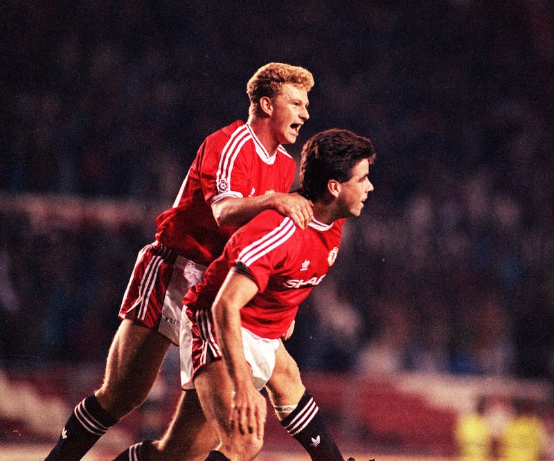 Mark Robins (left) during his days as a Red Devil