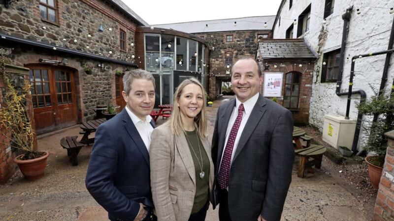 Stuart and Barbara Hughes, owners of Hughes Craft Distillery with Derick Wilson, business development manager at Ulster Bank 