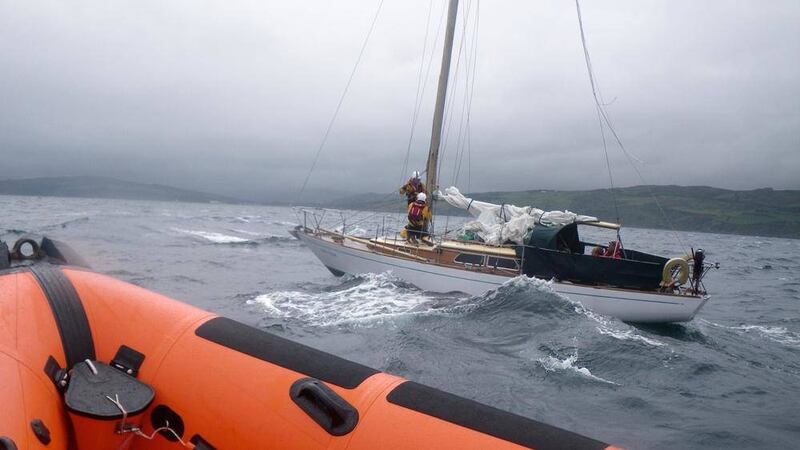 Four people were rescued from a yacht off the north Antrim coast yesterday 